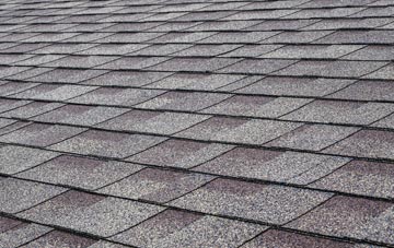 Trumpet tiles for shallow pitch roofing